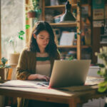 What is personal finance? A person is building a finance budget in laptop.